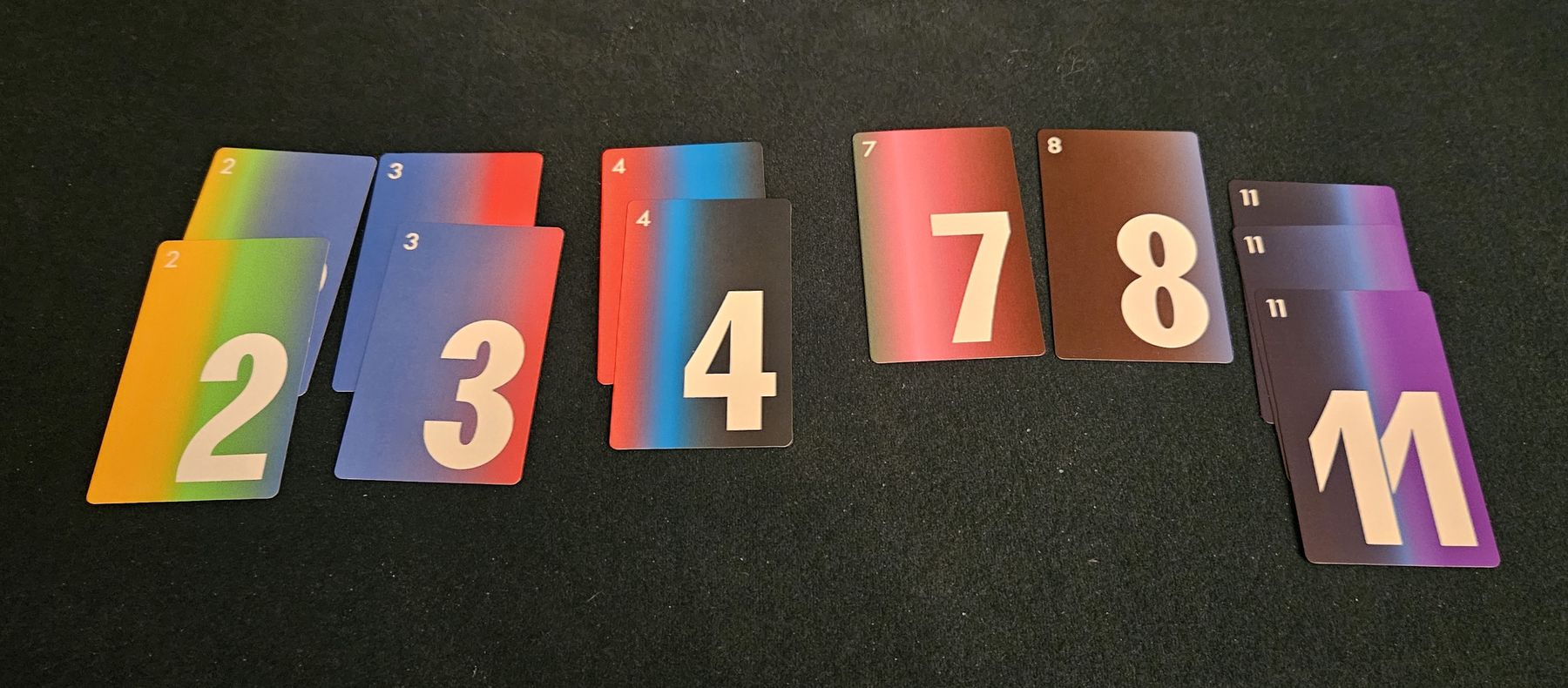13 Leaves numbered cards forming a row during play