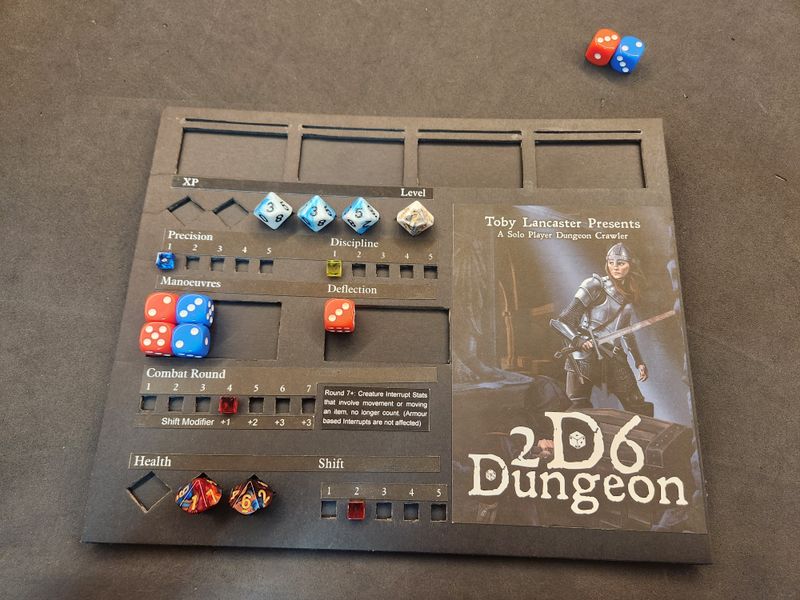 2D6 Dungeon player board and dice