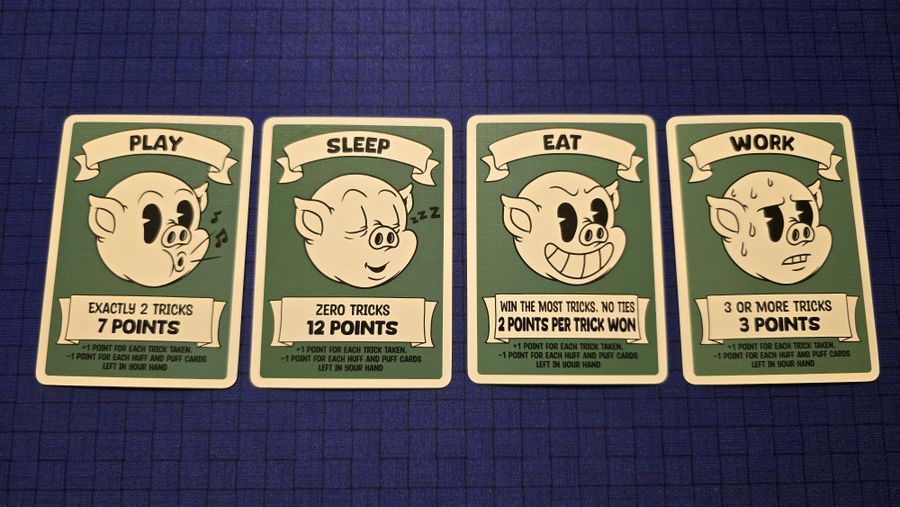 3 Tricky Pigs cards during a trick