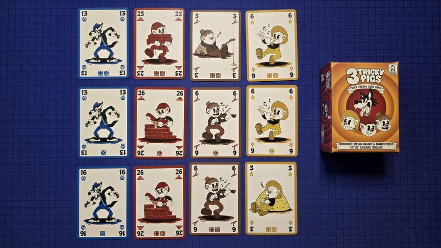3 Tricky Pigs cards arranged for play