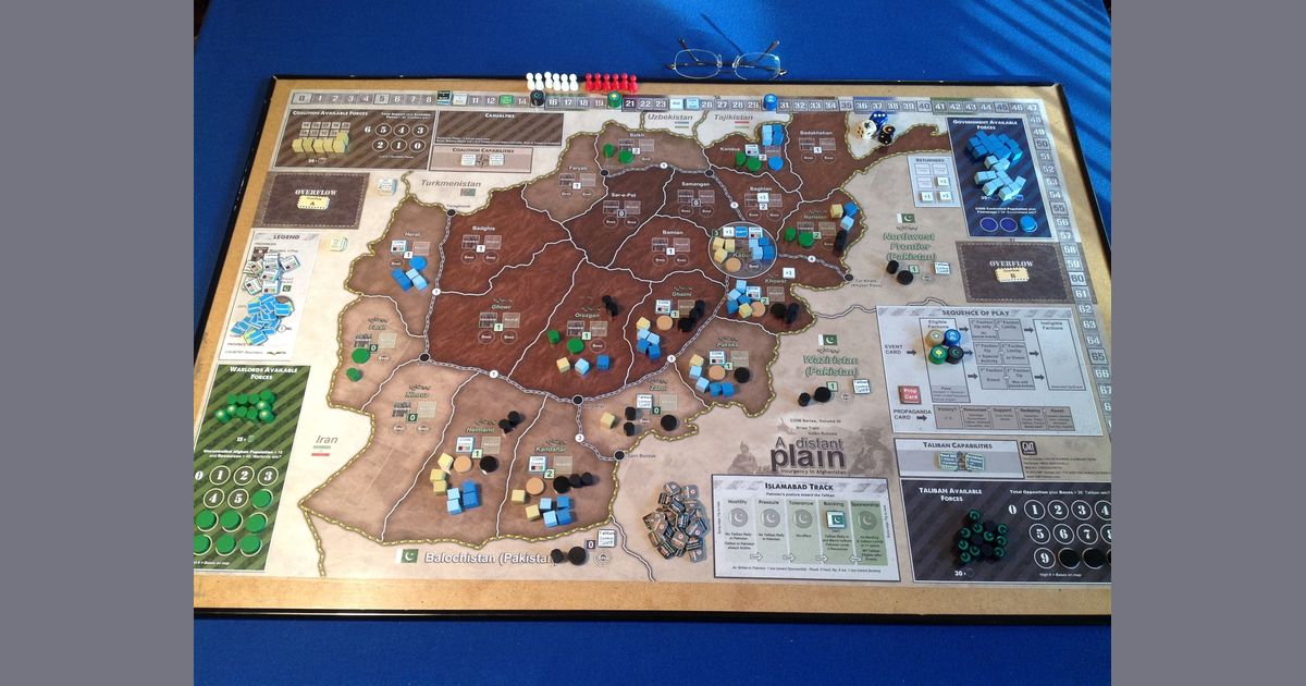 A Distant Plain game setup on table