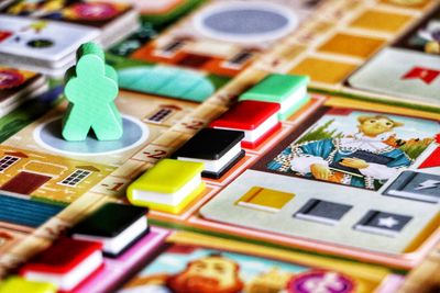 Alma Mater board and player university during play