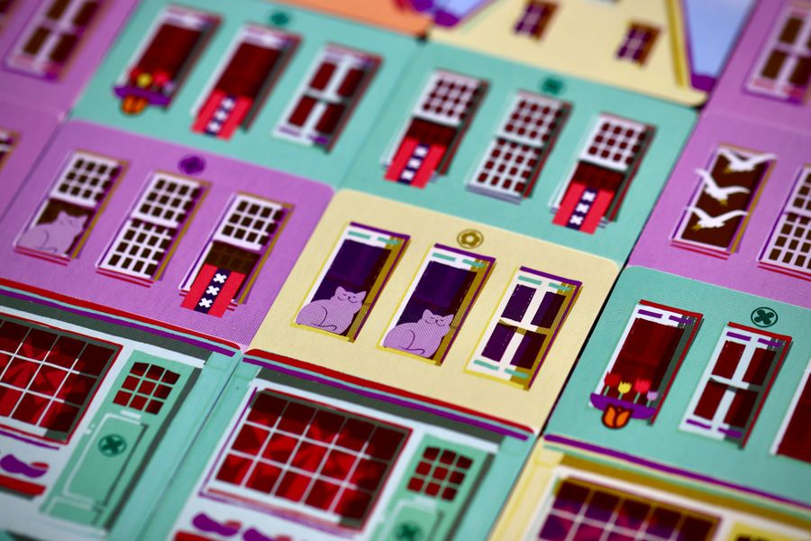 Rows of completed canal houses made from cards