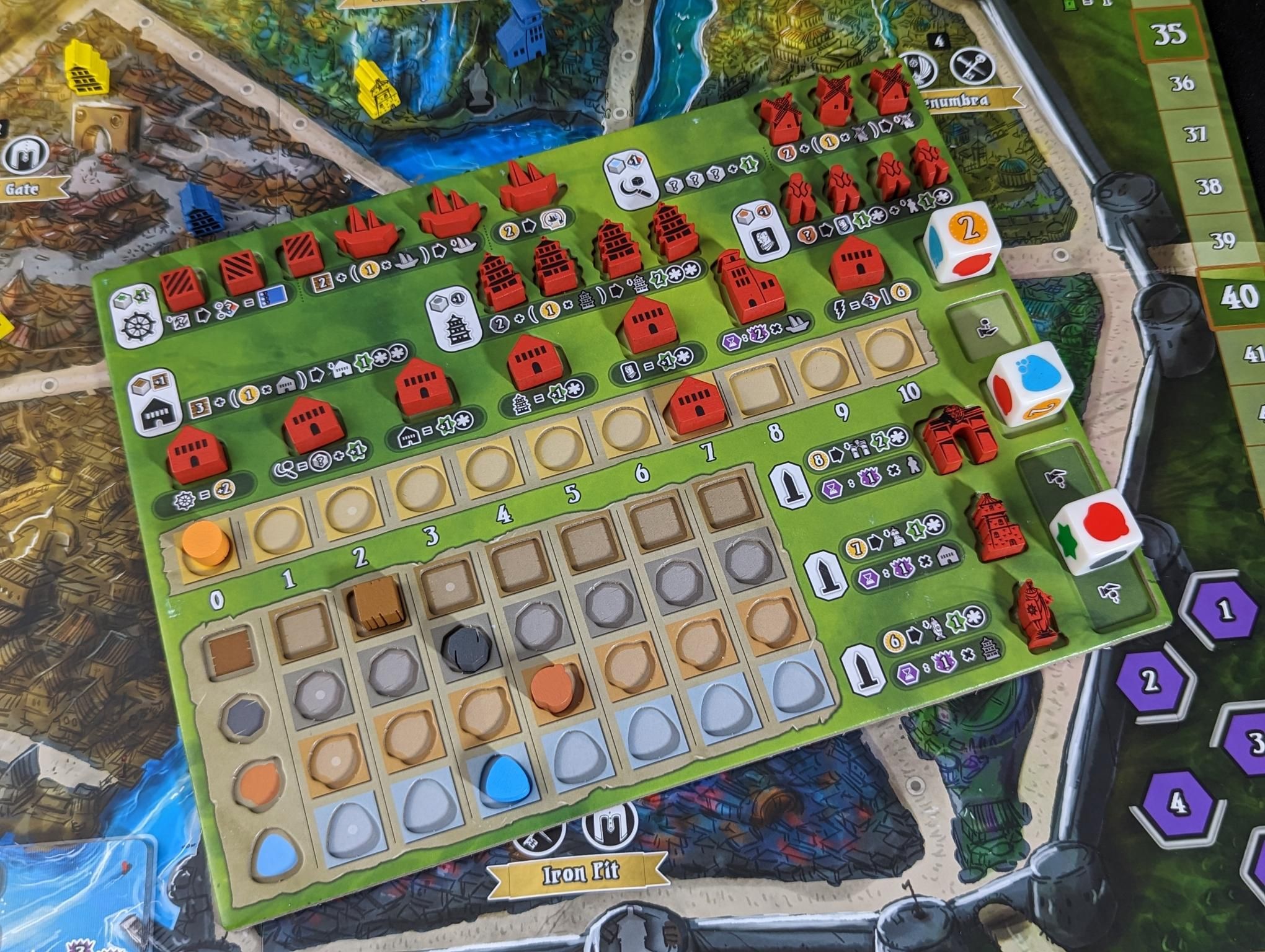 Castellans dice, tokens, tiles, and player components