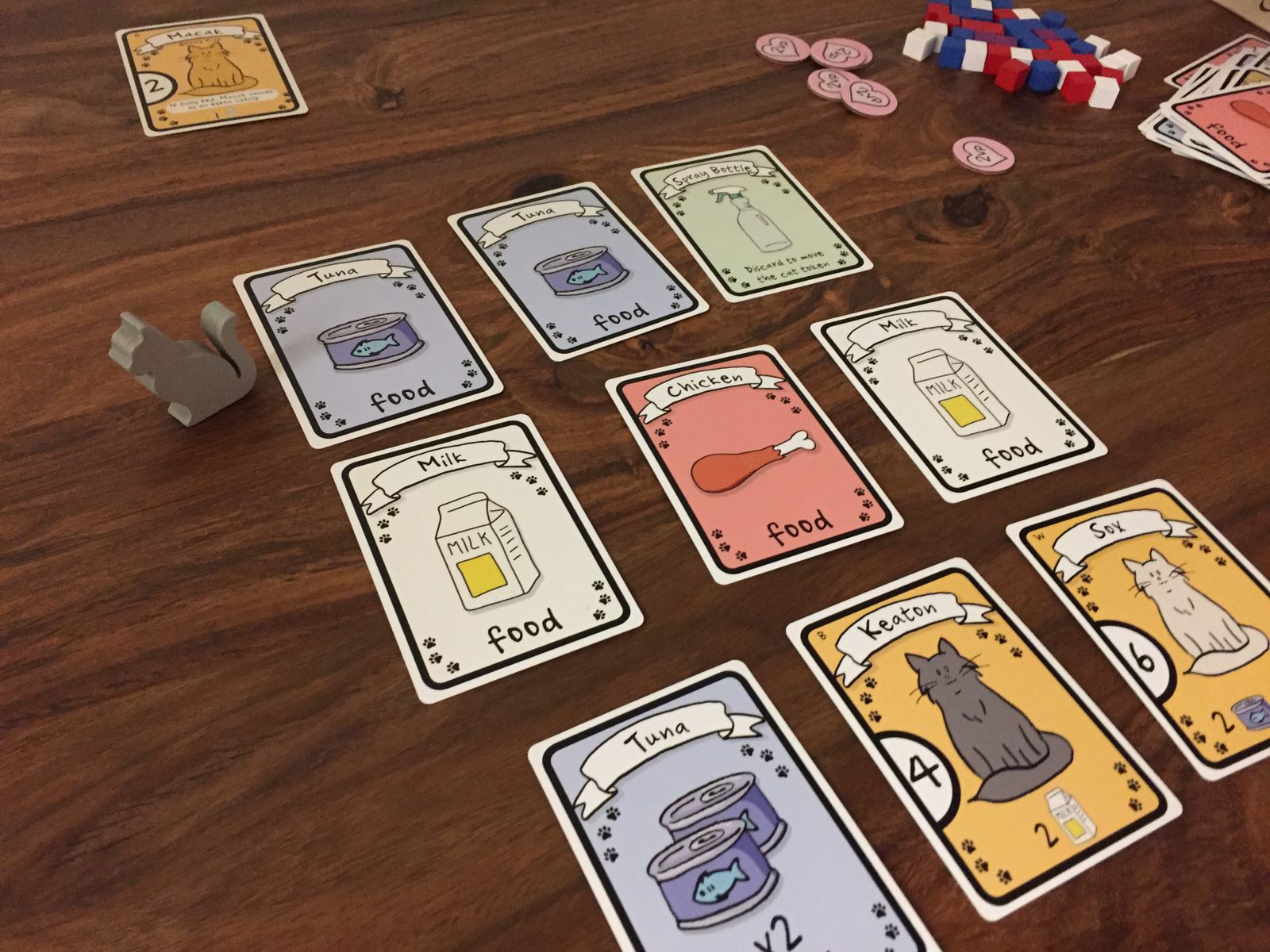 Cat Lady mid game with nine card grid cat token food cubes and player collection