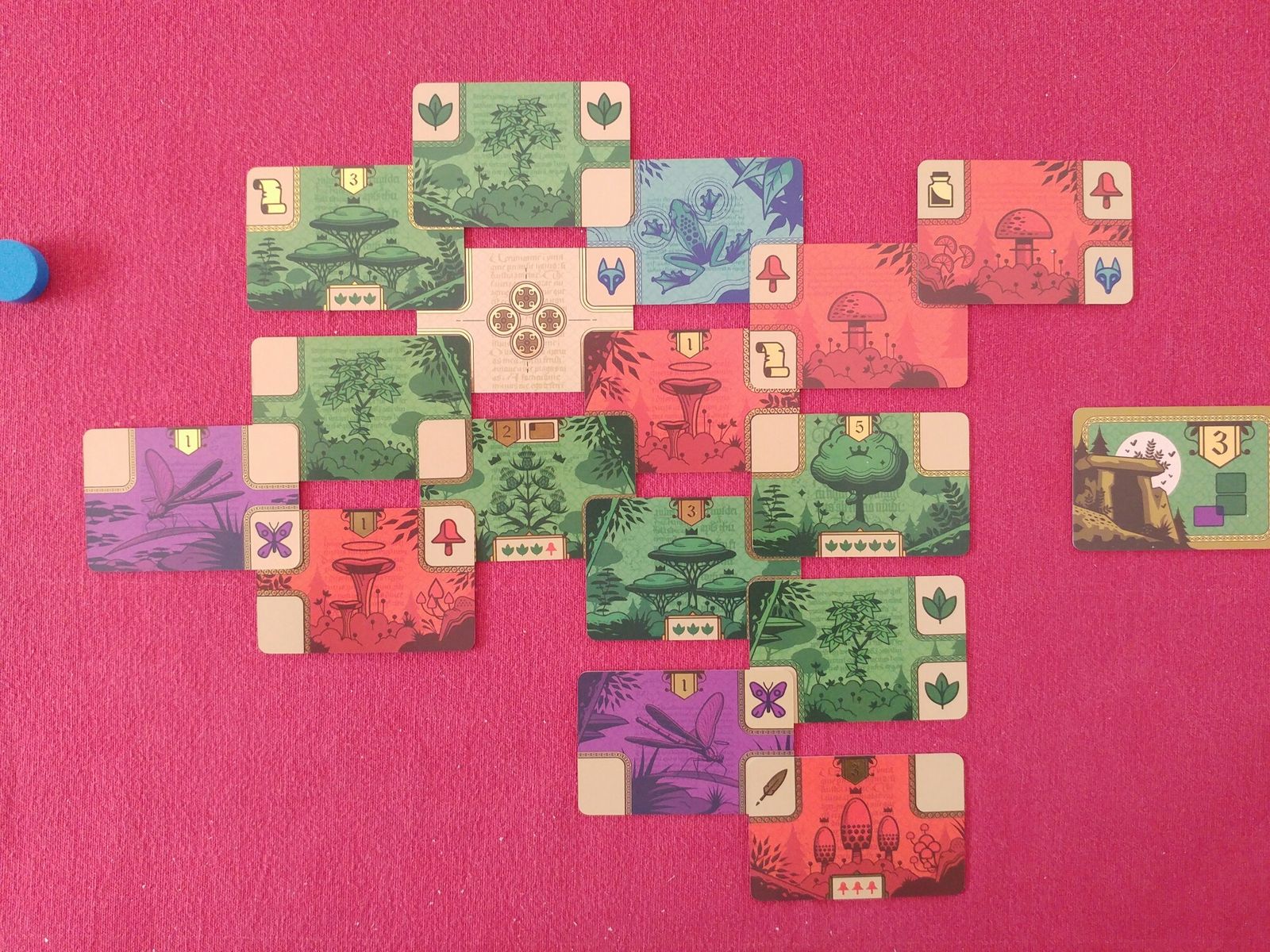 Two Codex Naturalis card tableaux at the end of a game