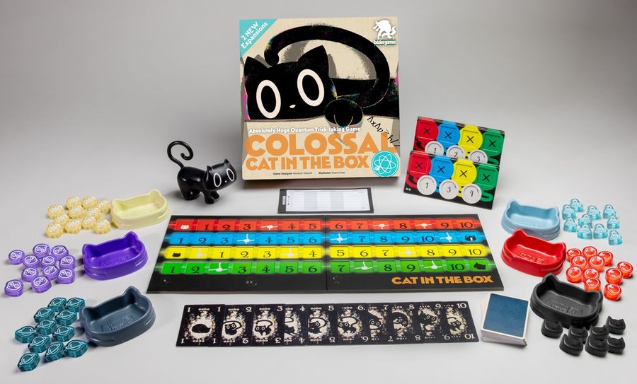Colossal Cat in the Box components beside the box