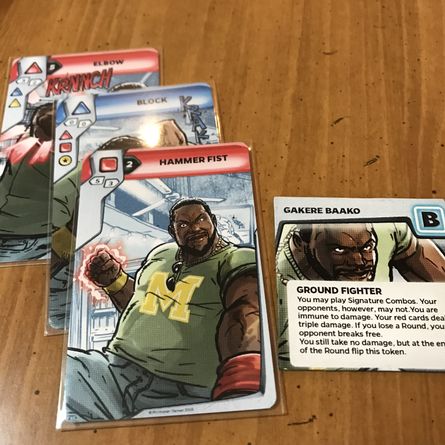 Combo Fighter combat cards arranged for play