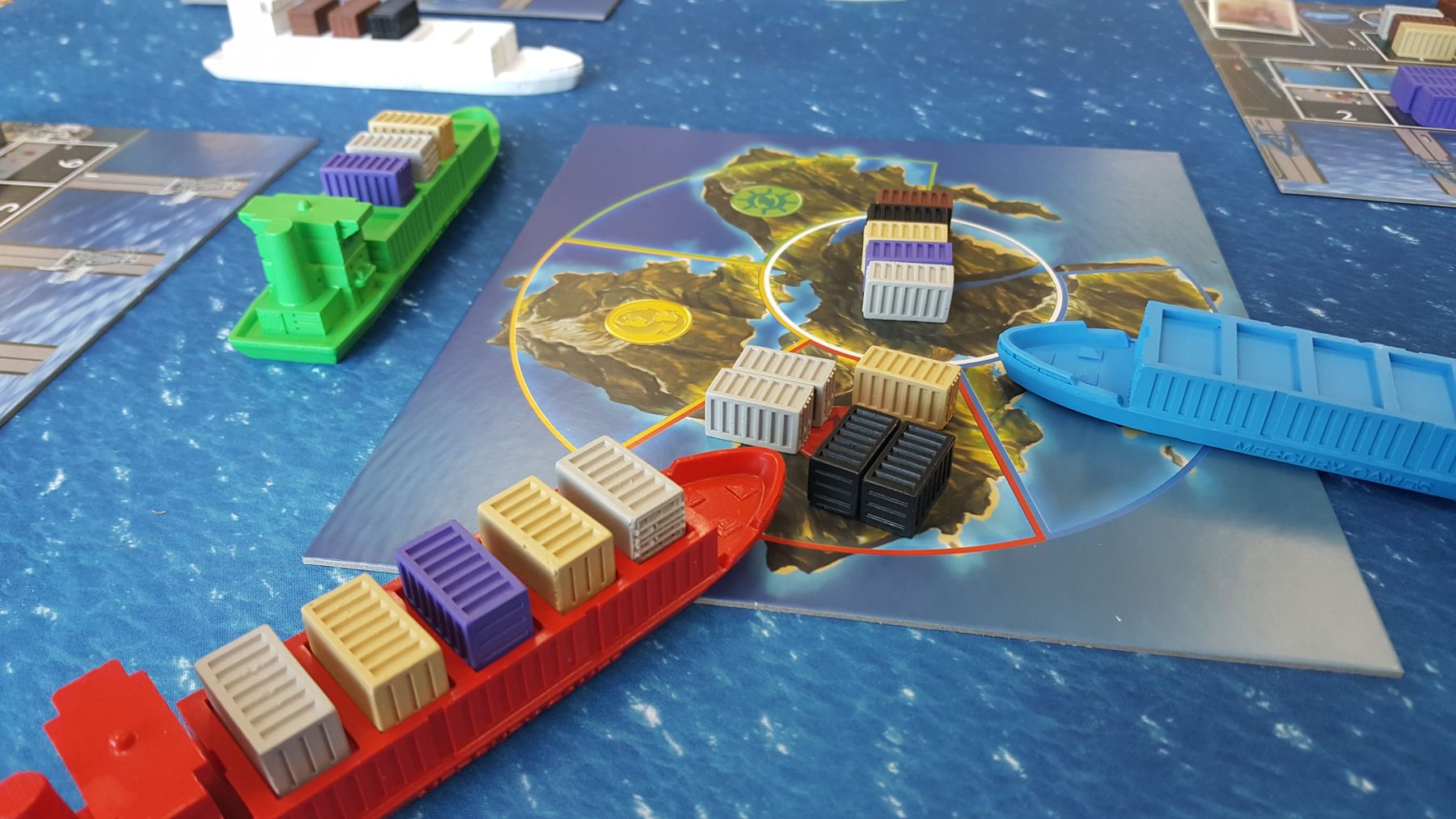 Container Jumbo Edition game in progress with five ports ships and island