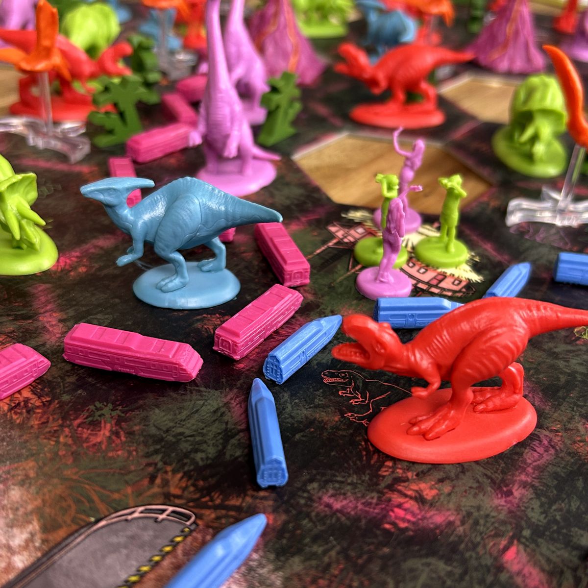 Cretaceous Rails game components and miniatures