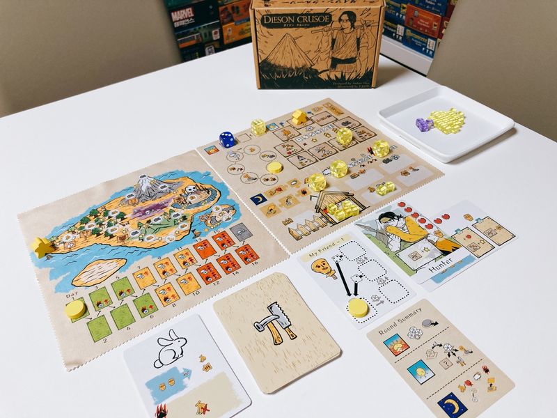 Dieson Crusoe boards cards dice and wooden components