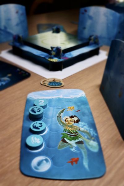 Layered transparent ocean cards in Dive