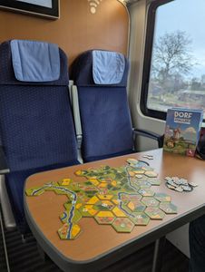 Dorfromantik Light Luggage being played during train travel