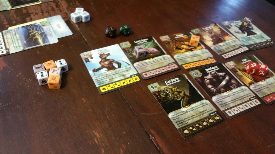 Faerun Under Siege character cards and dice