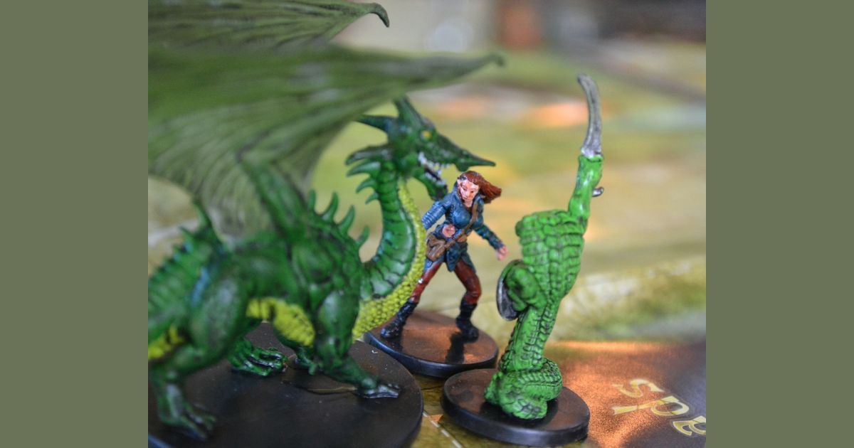 Dungeons and Dragons Miniatures game in progress on a grid map