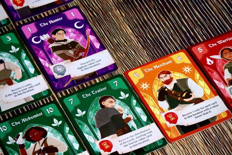 Emblems cards and gold coin scoring