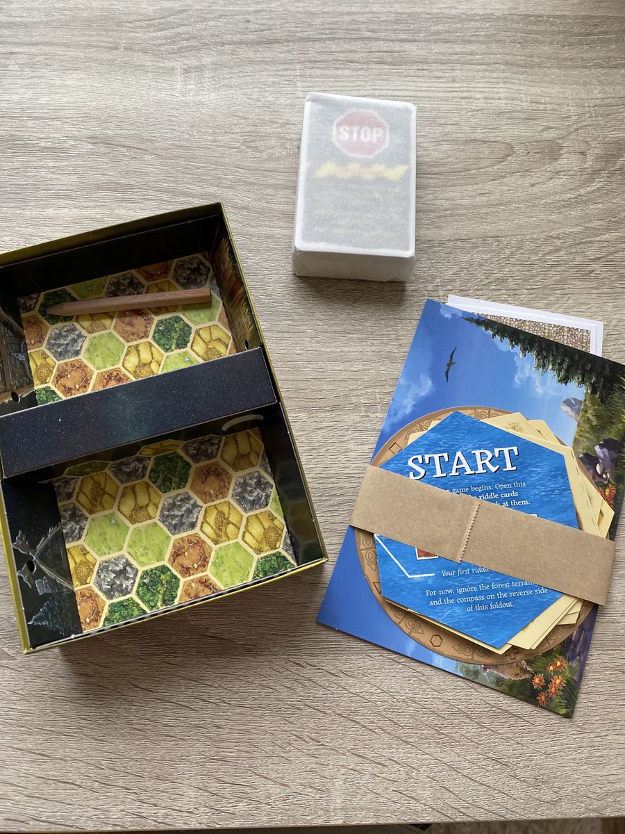 EXIT Adventures on Catan components in box