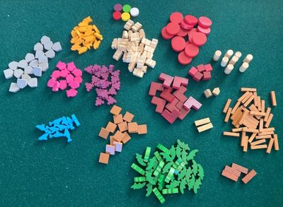 Wooden Faiyum game components arranged together