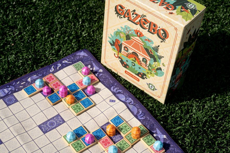Gazebo board game being played outdoors