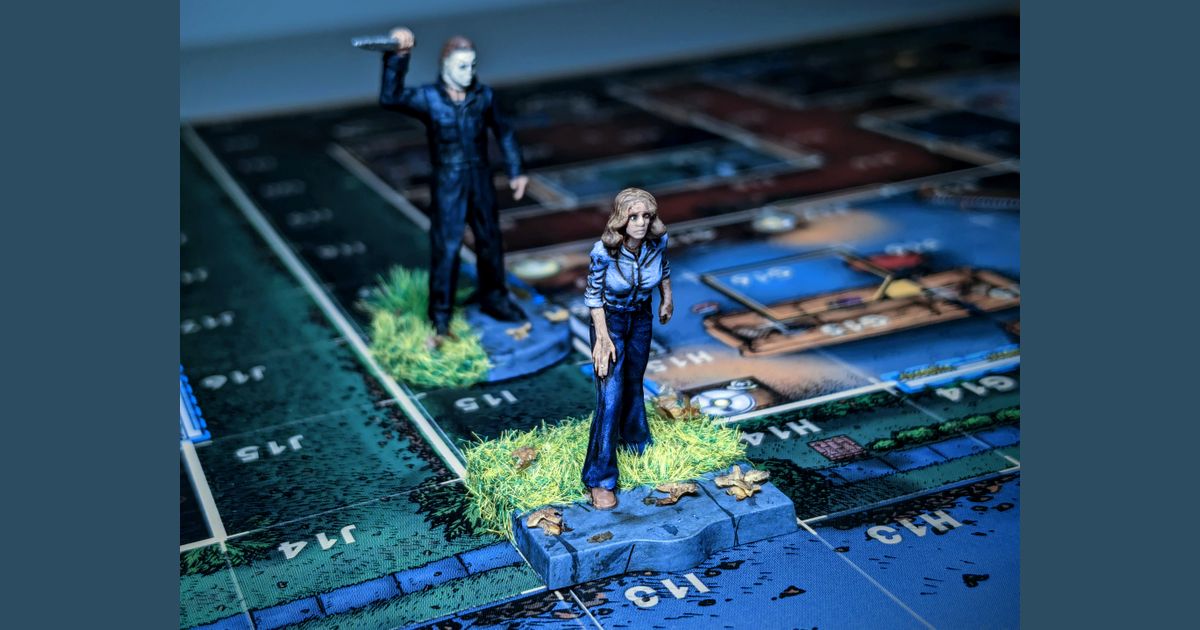 Michael Myers pursuing victims in the Halloween board game