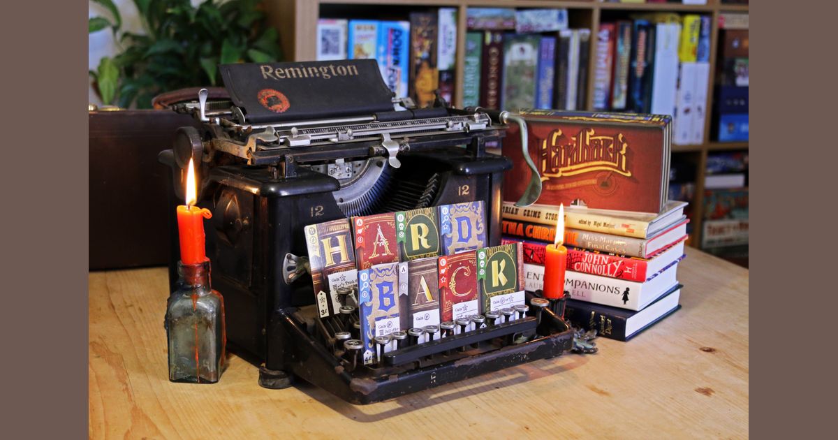 Hardback board game in progress with letter cards