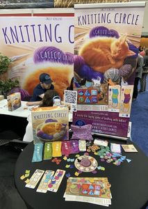 Knitting Circle components displayed beside the box