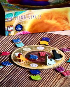 Complete Knitting Circle board game table setup