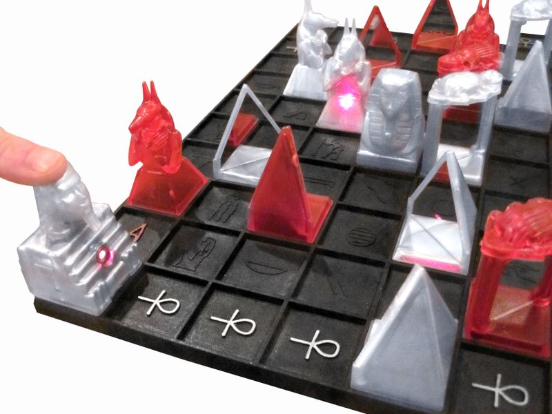 Laser beam reflecting across a Laser Chess board