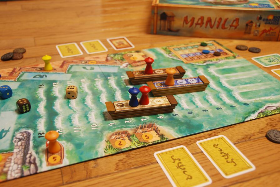 Manila board game in progress with four players