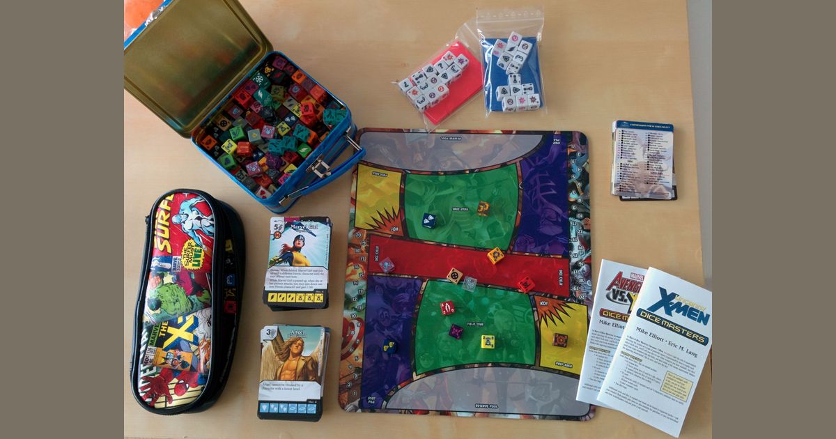 Marvel Dice Masters game arranged on a playmat