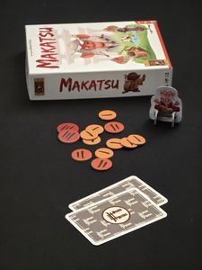 Meister Makatsu ninja cards and penalty tokens during a game
