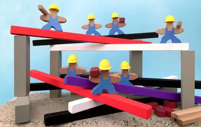 Men at Work wooden construction during play