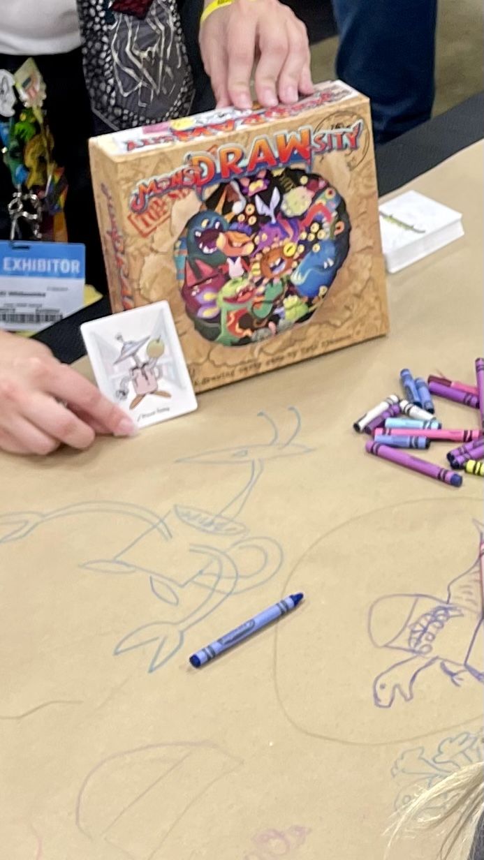 Players drawing monsters in MonsDRAWsity