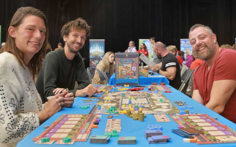 Movers and Shakers board game being played at a convention