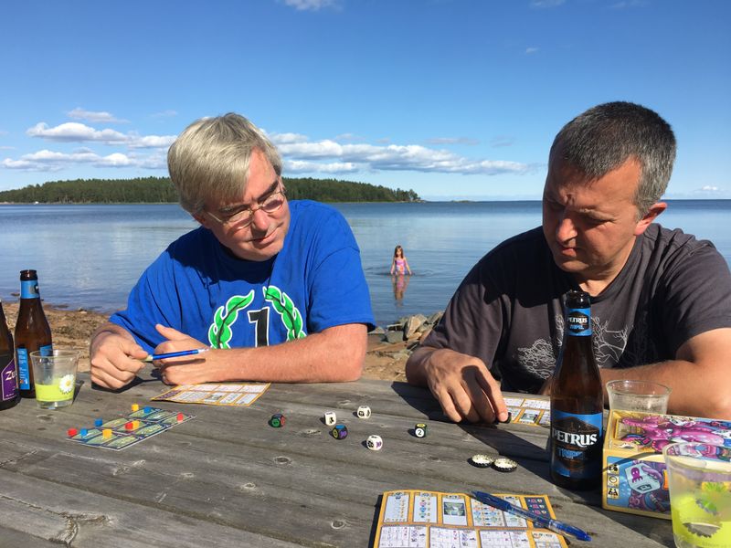 OctoDice game in progress with sheets and dice