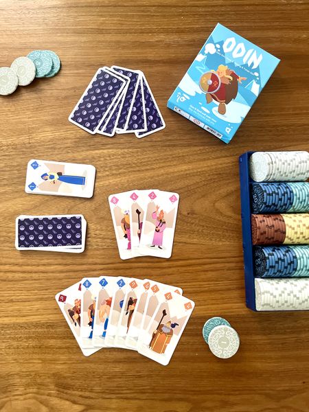 Two players playing Odin card game