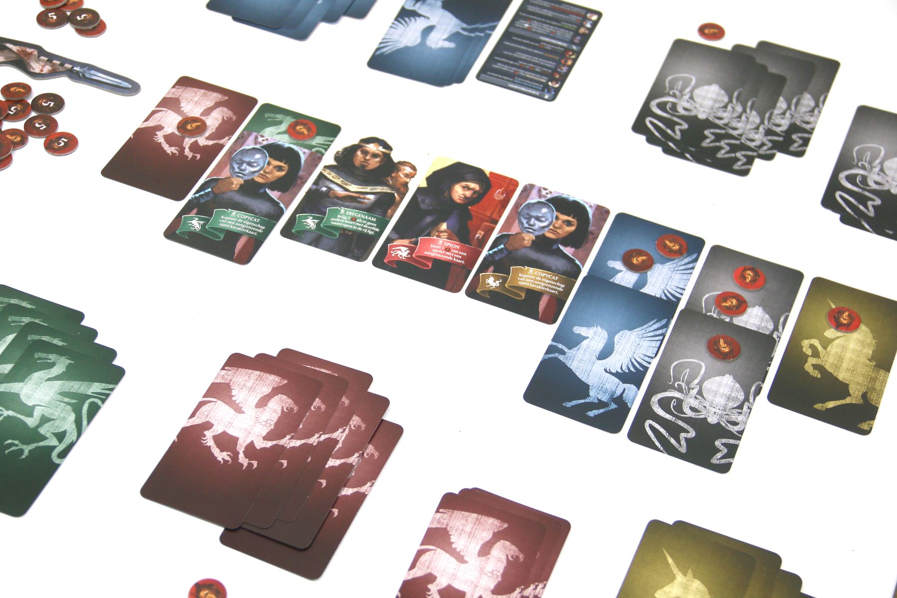 Oriflamme character cards and influence tokens close up