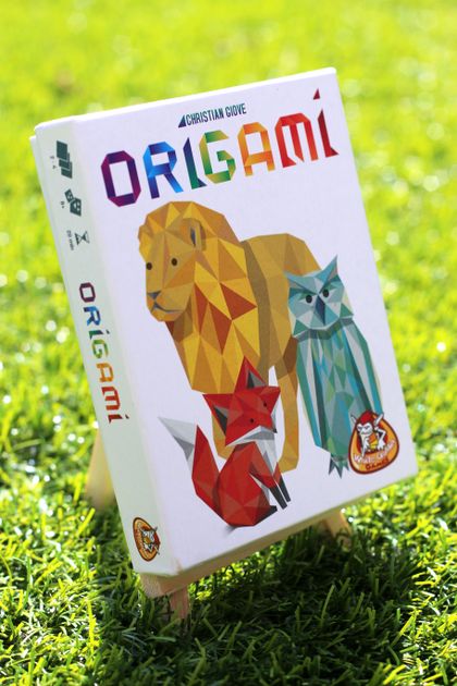 Origami cards displayed during a game
