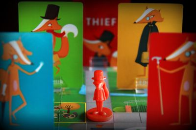 Outfoxed clue tokens and suspect cards
