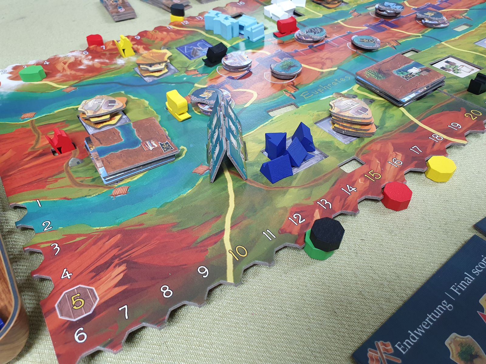 Papyria central landscape and player pieces