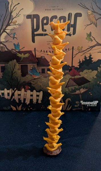 Stack of colourful wooden bird pieces from Perch