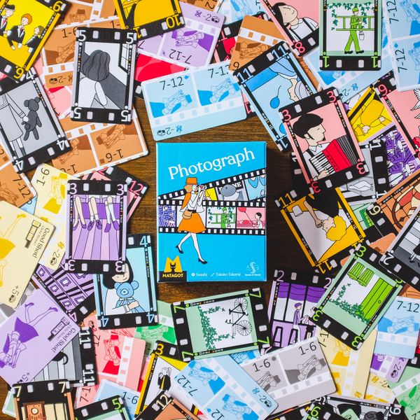 Photograph card game in progress on a table