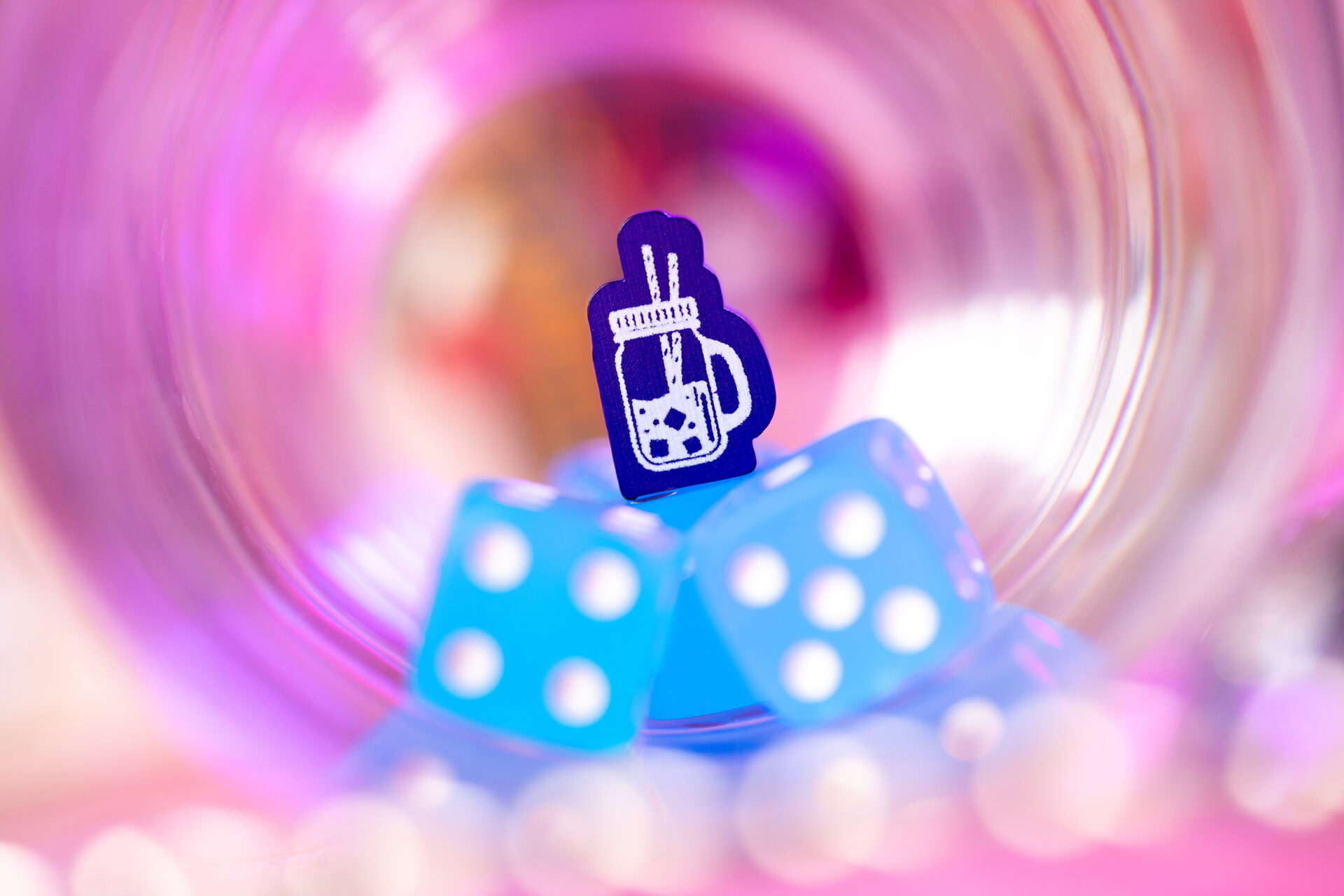 Piña Coladice player rolling dice beside coaster grid