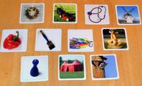 Eleven Pluckin Pairs image cards on a table