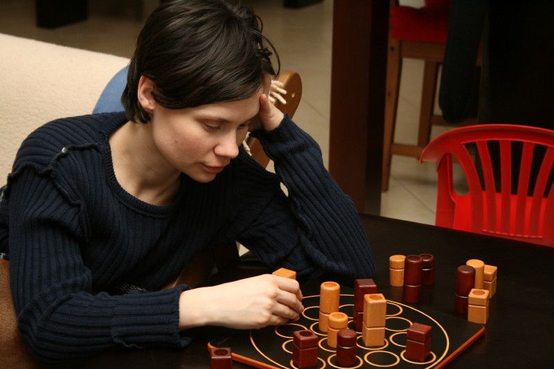 Quarto position with a wooden piece ready to be placed