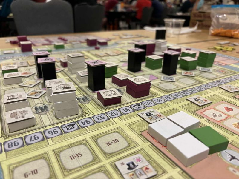 Three players playing Raising Chicago