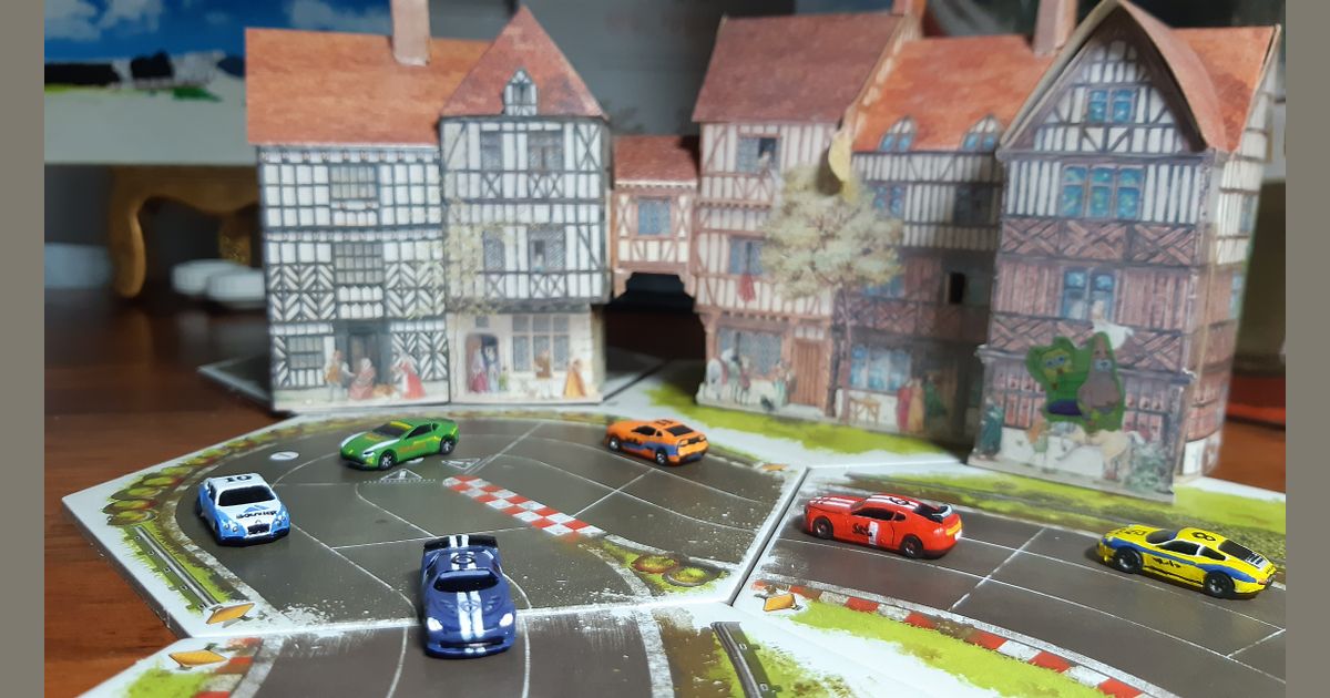 Rallyman GT board game components and cars during play