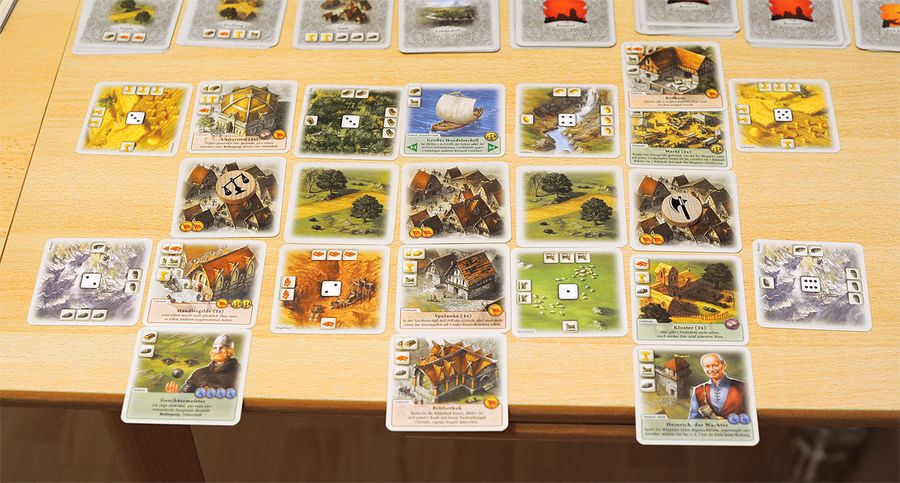Completed Rivals for Catan card tableau after a duel