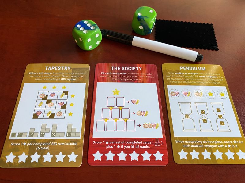 Three dry-erase realm cards from Rolling Realms