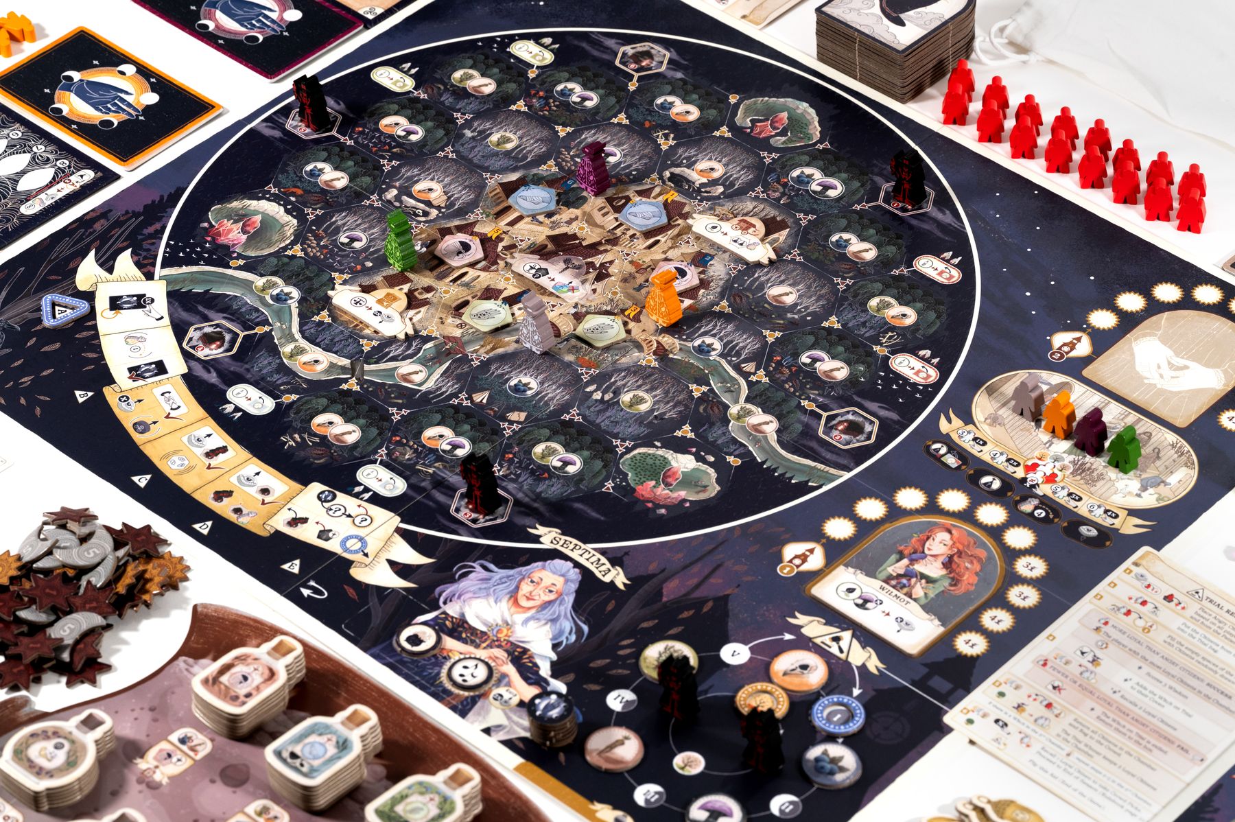 Septima board game fully set up with main board coven boards cards and tokens